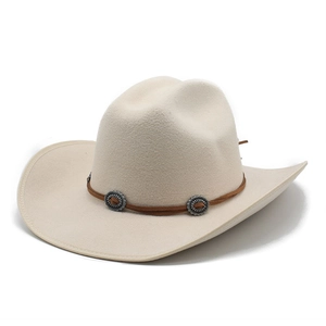 Detail of beige wool felt cowboy hat with brown leather band and vintage metal buckles