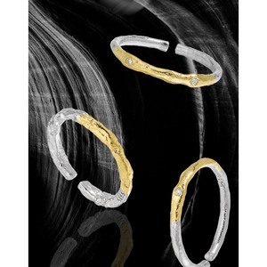 Two-piece 925 silver stackable rings with lava texture gold plating and tiny zircon stone
