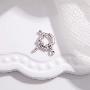 Macro view of S925 sterling silver round sailor clasp with three loops for DIY jewelry