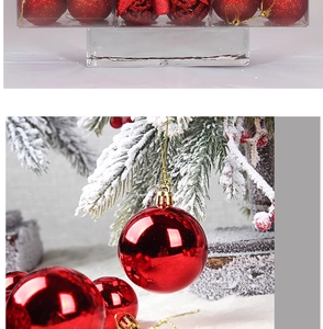 Detail of red glitter and glossy Christmas balls in packaging and hanging on tree