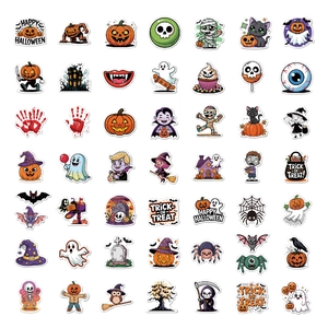 Flat lay of 50 colorful cartoon Halloween stickers featuring pumpkins, ghosts, and black cats
