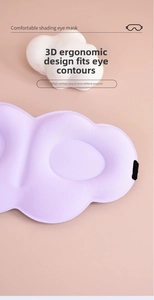 Close-up of a 3D ergonomic light-blocking sleep mask in lavender with cloud accessories