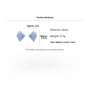 Detail showing irregular blue resin earrings with silver pins and dimension of 2.5cm by 2cm