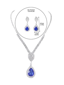 Detail view of water drop blue rhinestone necklace and earrings set with dimensions
