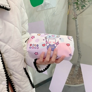 Close-up of a cute cartoon canvas pencil case with bear patterns and zipper closure
