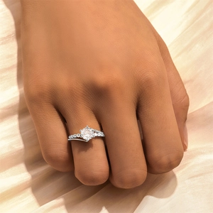 Detailed view of S925 sterling silver hollow ring with sparkling zircons on finger