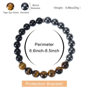 Triple layer protection bracelet with tiger eye stone and hematite beads on white backdrop