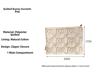 Detailed dimensions of quilted rabbit pattern makeup bag measuring 24cm by 17cm