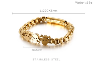 Detail showing skull charm measurements and stainless steel bracelet specs in gold