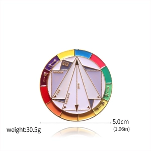 Detail view of round metal enamel color wheel brooch showing diameter and weight specs