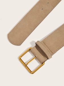 Detail of vintage wide suede belt featuring a matte gold square buckle and stitched edges