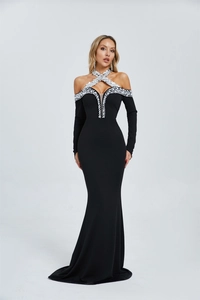 Detail of cross halter neckline with sparkling pearls and rhinestones on black evening gown