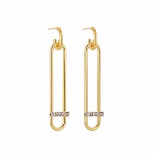 Detail of elegant gold U-shaped chain earrings with micro-set rhinestones and zircon gems