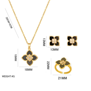 Lucky four-leaf clover jewelry set with black enamel and gold plating including size specs