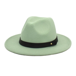 Detail of mint green fedora wool hat with black leather strap and gold metal rivet