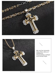 Detailed close-up of double-layered stainless steel cross pendant with byzantine chain