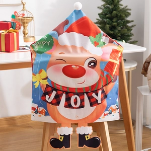Christmas reindeer chair back cover with red hat and Joy scarf for festive dining decor
