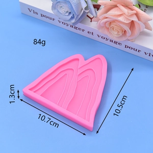 Pink silicone mold with layered mountain peaks design for DIY soap and chocolate making