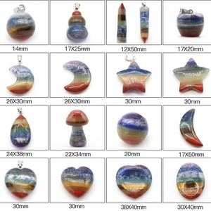 Various shapes of colorful natural crystal and amethyst pendants with metal rings