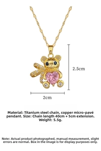 Detailed view of luxury bear pendant with pink heart zircon and 40+5cm steel chain size