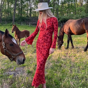 Bohemian floral maxi dress with long flare sleeves and red flower pattern for summer style