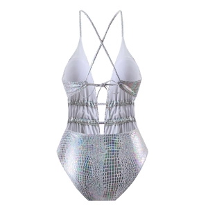 Detail of white and silver laser-effect one-piece swimsuit with snake texture and drawstrings