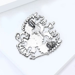 Detail view of the secure silver eagle brooch closure and alloy pin mechanism back