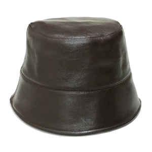 Close-up of dark brown PU leather texture and stitching detail on the bucket hat