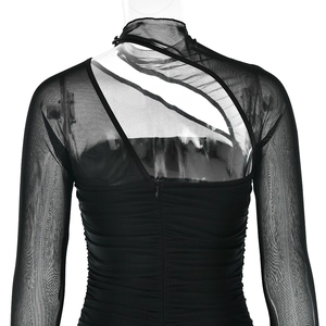 Detail view of sheer mesh sleeves, ruched fabric, and back hidden zipper on black dress