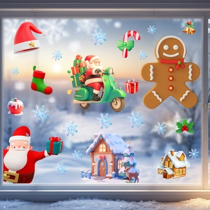 Detail showing 3D Santa and gingerbread man window stickers with snowy forest background