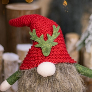 Christmas gnome plush doll with red knitted hat and green elk logo for festive decor