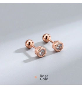 Detail of rose gold S925 sterling silver screw back earrings with round cubic zirconia