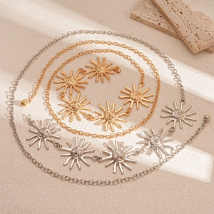Vintage sun pendant waist chain belt with pleated texture in gold and silver metal finishes