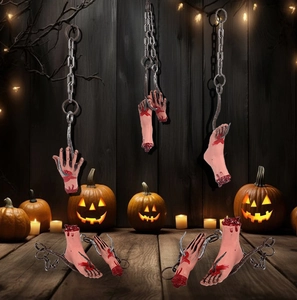 Detailed view of Halloween hanging chains with realistic bloody severed hands and feet
