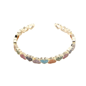 Elegant gold open heart bracelet with colorful cubic zirconia stones on white background