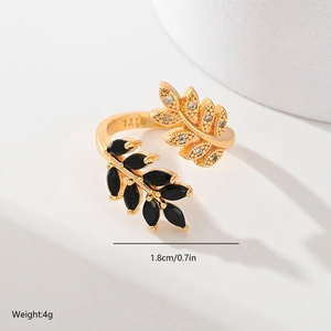 Detail view of gold leaf ring with black gems and 925 engraving with 1.8cm size mark