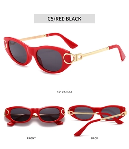 Vue en trois angles de lunettes de soleil punk rouges avec branches en métal doré