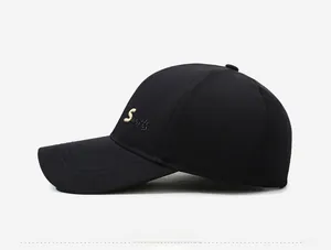Detailed side view of black baseball cap with 3D letter S embroidery and six-panel structure