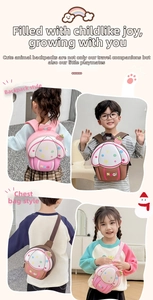 Detail view of cartoon cupcake kids chest bag with strawberry charm and polka dots