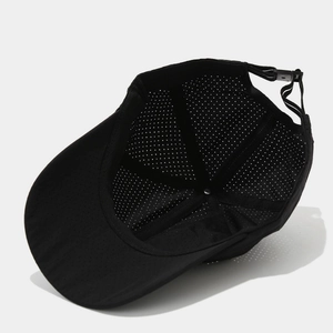 Black breathable baseball cap with laser-cut holes and adjustable strap for sports