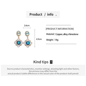 Detail specifications of vintage cameo drop earrings with blue stone and gold plating