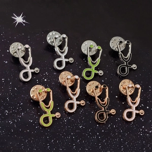 Creative stethoscope enamel lapel pins for doctors in various colors and metallic finishes