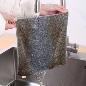 Thick bamboo charcoal fiber kitchen cleaning cloth rinsing under running water