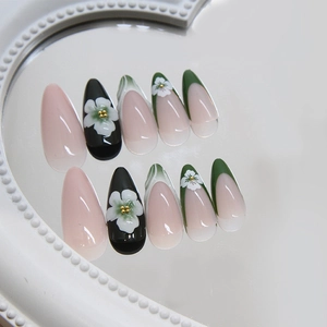 Minimalist French dark green press-on nails with 3D floral accents and golden beads