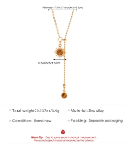 Detailed view of gold zinc alloy sun pendant necklace with precise size measurements
