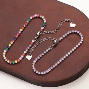 Elegant stainless steel bracelet set featuring colorful pavé zircon stones and heart charm