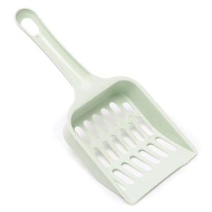 Detail of mint green plastic cat litter scooper with built-in sifting holes on white background