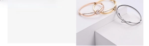 Vacuum plated stainless steel butterfly bangle with mother of pearl and crystal details