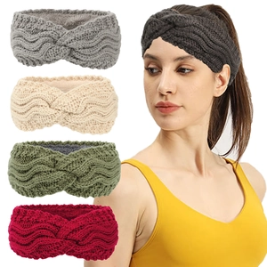 Detailed knit texture and warm fleece lining of twisted winter headbands in five colors