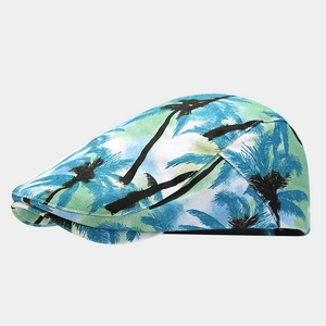 Detail view of breathable cotton fabric with tropical palm tree patterns on a flat cap
